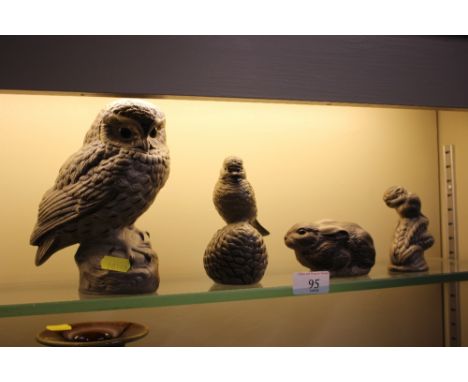 Four Poole pottery ornaments in the form of a mouse, a rabbit, an owl and a bird 