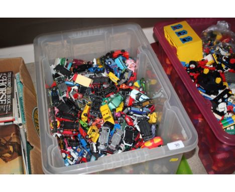 A box of die-cast model vehicles 
