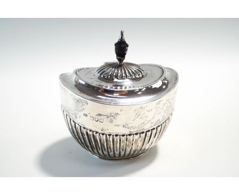 A late Victorian silver tea caddy, by William Hutton & Sons Ltd, London 1897, of oval gadrooned form, with hinged cover, 11 c
