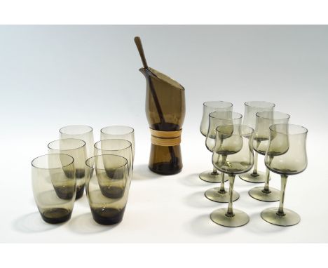 A Czech smoked glass cocktail jug, mixing stick and twelve glasses