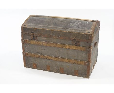 A large metal bound dome top travel trunk, 92cm wide