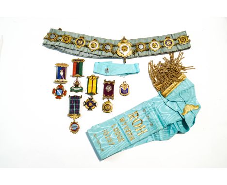 A large quantity of Masonic Lodge gilt metal and enamel medals, badges and a sash