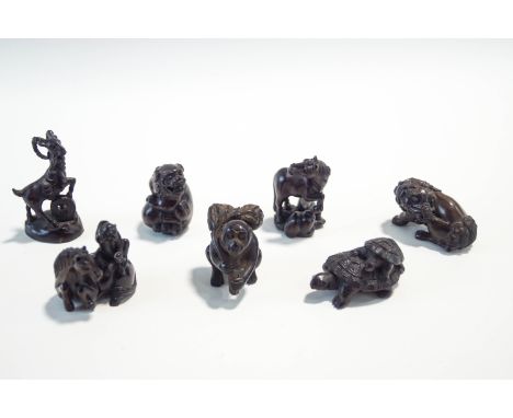 A collection of seven modern Chinese carved wood netsuke