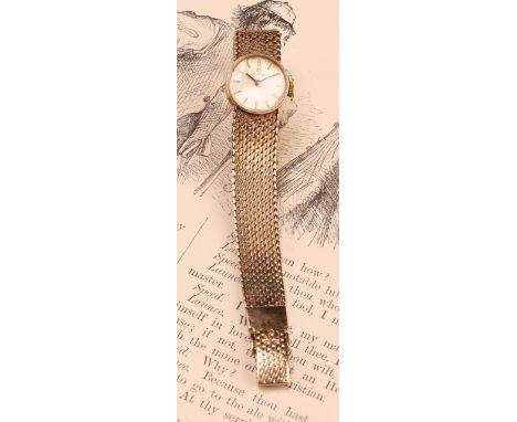 Omega - a lady's 9ct gold cased wristwatch, silver dial, block baton markers, manual wind 484 cal 17 jewel movement, serial n