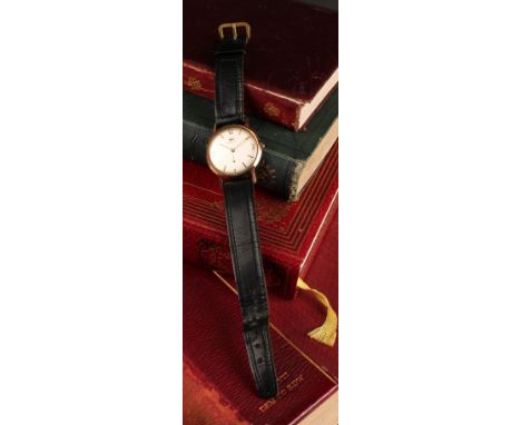 A Marvin 9ct gold cased wristwatch, silvered dial, quartered Arabic numerals and block baton markers, subsidiary seconds,  52