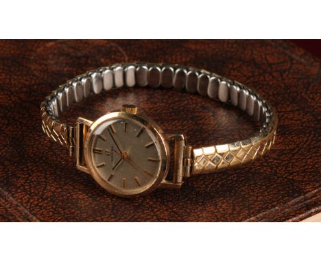 Omega - a 1960s lady's 9ct gold cased wristwatch, 21mm diameter case, silvered dial, block baton markers, centre seconds, 630