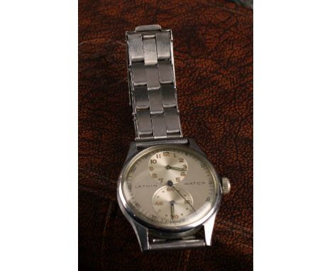 A vintage Lathin Swiss gentleman's stainless steel wristwatch, with tropical dial, two subsidiary vertical set dials, Arabic 