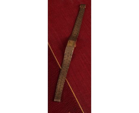 Bueche Girod  - a lady's 9ct gold cased bracelet wristwatch, textured case and bracelet, gold square dial, block baton marker