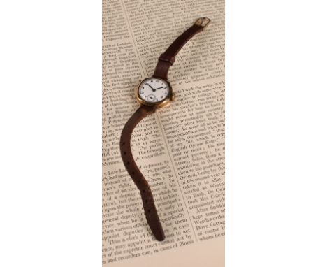 A 1940s Uno 9ct gold cased wristwatch, 24mm diameter case, white dial, Arabic numerals, subsidiary seconds, manual wind 15 je