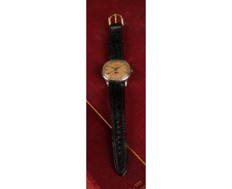 A Rare Invicta triple calendar moon phase wristwatch, brushed dial, raised Arabic numerals, centre seconds, triple day date a