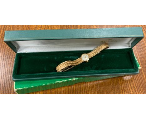 Rolex - a Lady's Precision 9ct gold cased wristwatch, silver dial, block baton markers, 1401 cal Swiss signed 18 jewel manual