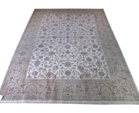 FINE TABRIZ DESIGN PART SILK CARPET, 352cm x 260cm, all over palmettes and vines on an ivory field within multiple correspond