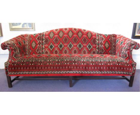 SOFA, George III style mahogany in Caucasian carpet design upholstery, 220cm W.