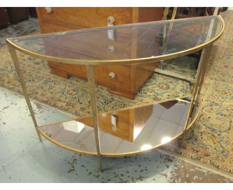 DEMI-LUNE CONSOLE TABLE, gilt metal framed two tier with a glass top above and mirrored one below, 127cm W x 76cm H x 43cm D.