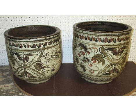 JARDINIERES, two, ceramic with fish decoration, 33.5cm H and 31cm H. (2)