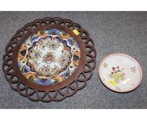 AN ANTIQUE ROUEN ARMORIAL PIERCED PLATE IN WOODEN MOUNT, TOGETHER WITH AN ANTIQUE CERAMIC DISH C18TH CENTURY 