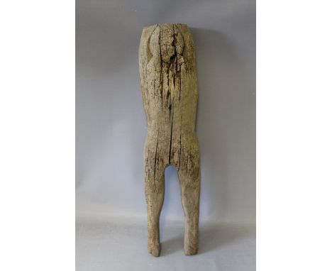 A LARGE SOUTH EAST ASIAN TRIBAL ART WEATHERED TEA WOOD CARVED FIGURE, in stylised human form, possible a Vietnamese or Laos g