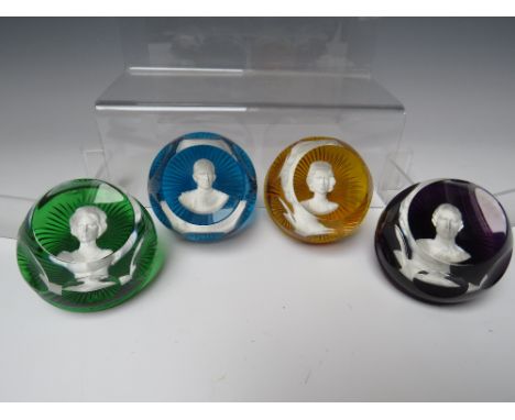 A SET OF FOUR BACCARAT CRYSTAL ROYALTY CAMEO / PORTRAIT PAPERWEIGHTS, comprising HM Queen Elizabeth II, Duke of Edinburgh, Pr