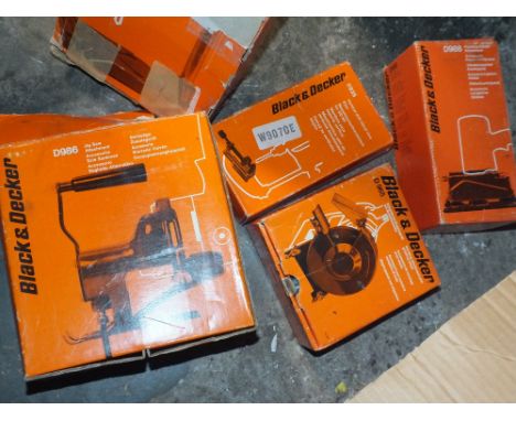 A BOX OF BLACK &amp; DECKER ITEMS TO INCLUDE GRINDING ATTACHMENT AND WHEEL, DRILL STAND, SANDER ATTACHMENT ETC