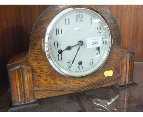 A VINTAGE OAK ENFIELD MANTLE CLOCK