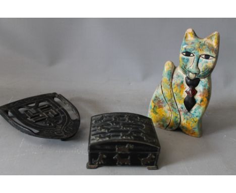 A MODERNIST PAPIER MACHE STUDY OF A CAT, H 16 cm, together with a small metal box decorated with studies of a Scottish Terrie
