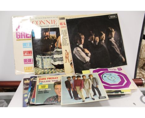 A QUANTITY OF LP RECORDS AND 7" PROMOTIONAL SINGLES TO INCLUDE THE ROLLING STONES, ELVIS PRESLEY ETC.&nbsp;&nbsp;