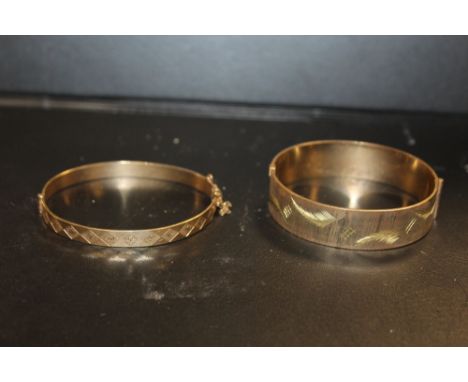 TWO VINTAGE GOLD PLATED BANGLES