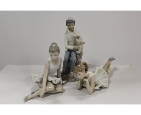 TWO NAO BALLET FIGURES TOGETHER WITH A FIGURE OF GIRL HOLDING A PUPPY