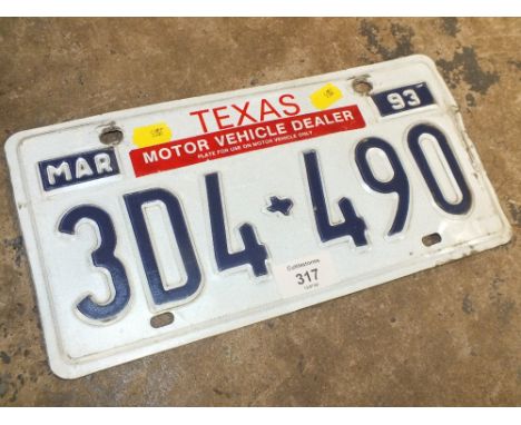 A VINTAGE ENAMELLED TEXAS LICENCE PLATE / NUMBER PLATE 