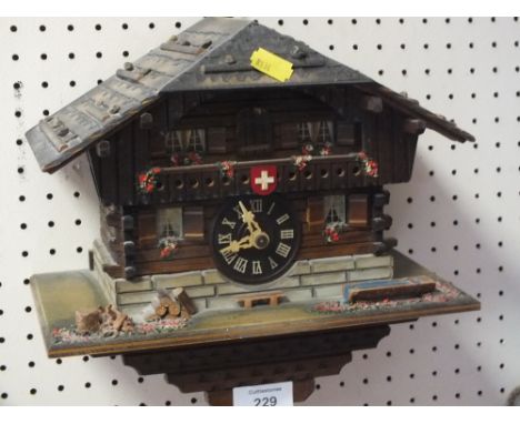 A VINTAGE CUCKOO CLOCK 