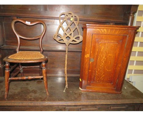 A CHILDS BERGERE CHAIR TOGETHER WITH A SMALL WALL HANGING CORNER CUPBOARD AND A CARPET BEATER (3)