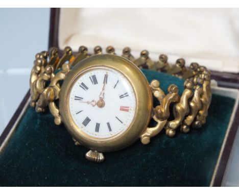 A VINTAGE LADIES WRISTWATCH, on usual expanding metal bracelet