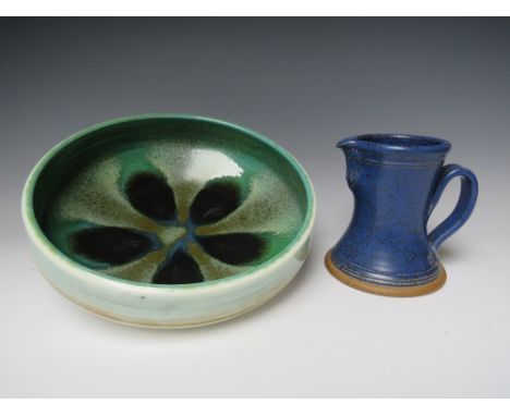 A VINTAGE POOLE POTTERY BOWL, H 9 cm, Dia. 27 cm, together with a blue studio pottery jug by NICK MEMBERY- Welsh school,  H 1