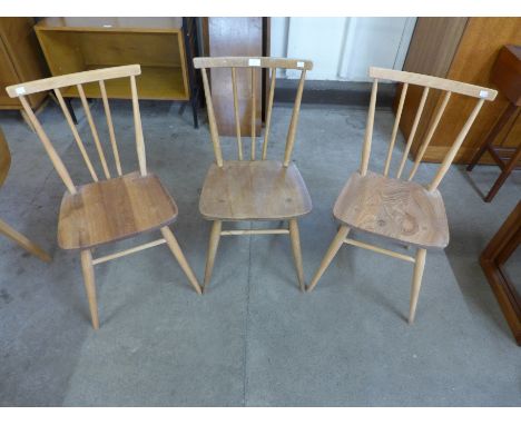 A set of three Ercol elm and beech 608 model chairs 