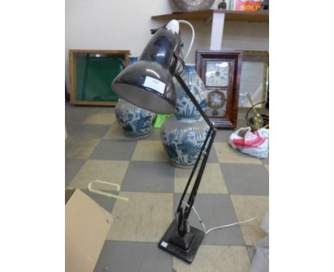 A Herbert Terry &amp; Sons black metal anglepoise desk lamp 