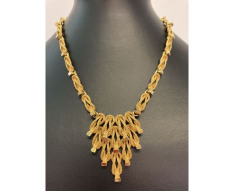 A vintage 1970's gold tone necklace with fixed hanging pendant, Marked to reverse '1594'. Approx. 14" chain length. 