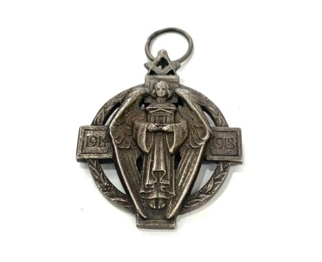 Silver Masonic Hall Stone Million Memorial Jewel  depicting a standing angel against a cross and wreath background with compa