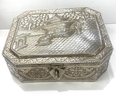 Silver Asian trinket box, no hallmarks but tests as silver, this item does have some damage to the base, please view images. 