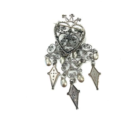 Silver crowned heart marriage brooch, with trefoil dangles and silver gilt spoons to ward of evil. Makers mark Sylvsmidja of 