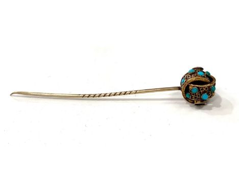 Victorian Gold and Turquiose Stanhope stickpin, The stanhope within a scrolling foliate knot surround depicting a nude lady. 