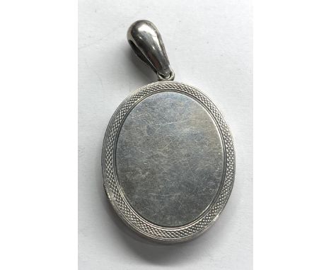 antique silver locket measures approx 4cm by 3.2cm not including loop not hallmarked but acid tested as silver 