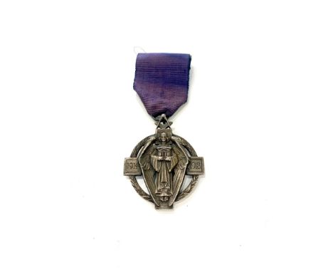 Silver Masonic Hall Stone Million Memorial Jewel  depicting a standing angel against a cross and wreath background with compa