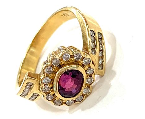 18ct Ruby and diamond set ladies ring, approximate ring size O, approximate total weight 5.9g. 