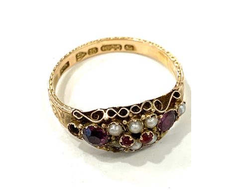 15ct gold ruby and pearl ladies ring, full hallmarks, approximate total weight 2.5g.missing end pearl 