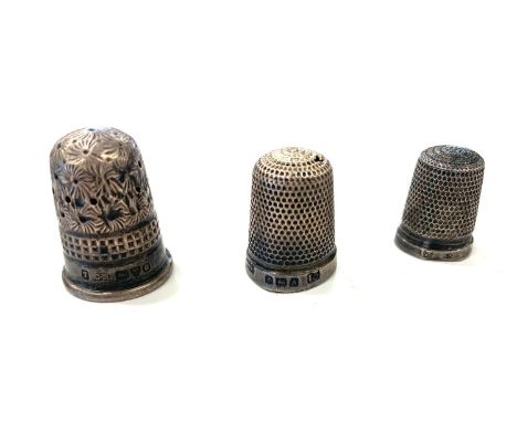 3 Silver thimbles 