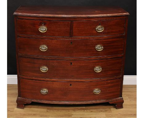 A Regency mahogany bow-front chest, slightly oversailing top with moulded edge above two short and three long graduated cockb