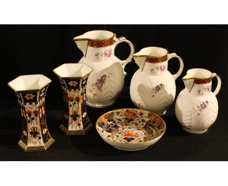 A pair of Royal Crown Derby witches pattern flared hexagonal vases, 13.5cm high; a 19th century Derby saucer; a graduated set