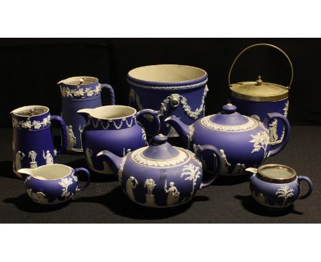 A Wedgwood Jasperware teapot; another; other Jasperware including biscuit barrel, jugs, planter 