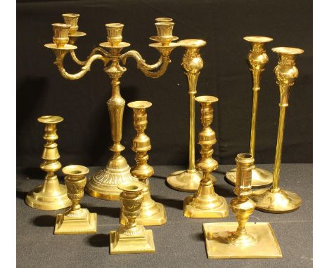 Metalware - a George III brass candlestick, c.1820; a pair of Victorian brass candlesticks, c.1860; others; a Neo-Classical s