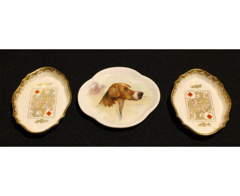 A pair of Wedgwood porcelain novelty shaped oval trays, decorated with playing cards, gilt border, 10cm wide, brown printed m